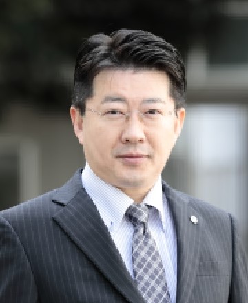 経営学部長 谷地 弘安